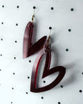 Orecchini a cuore in plexiglass bordeaux traslucido con gancio in argento 925 placcato oro